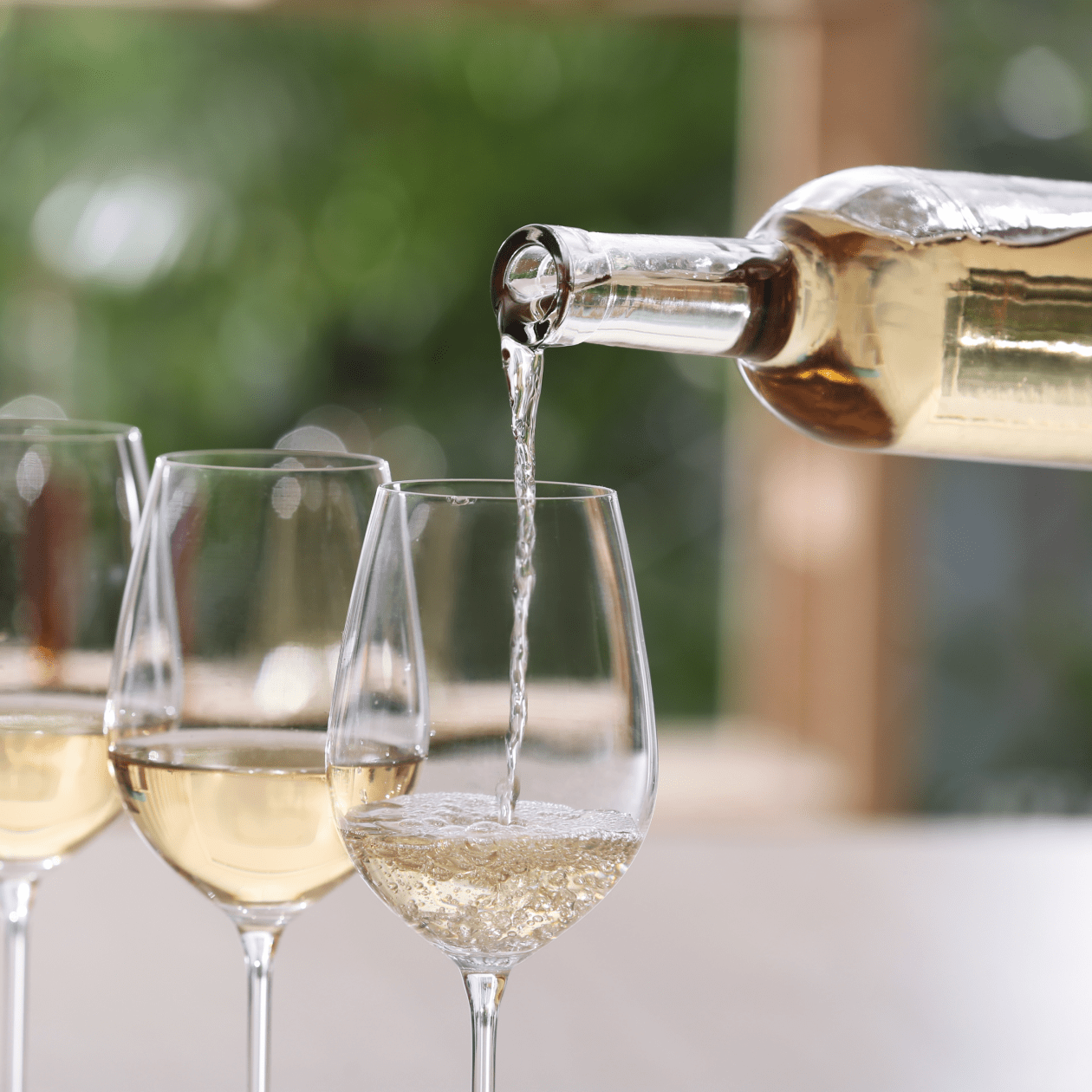Pouring a glass of wine | DRINKS