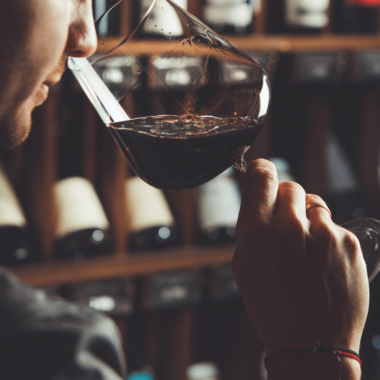 Smelling a Glass of Red Wine | DRINKS