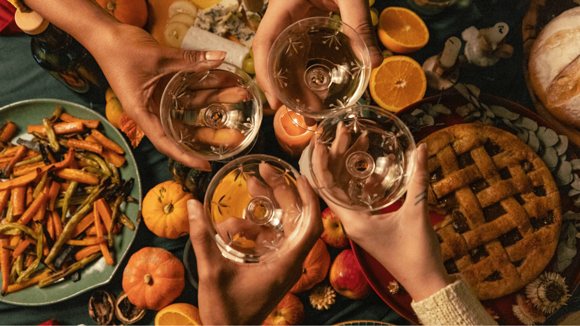 Cheersing glasses of white wine